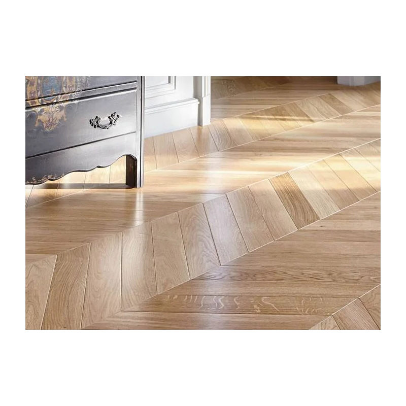 Parquet massif Chêne Rustique Point de Hongrie — lames brutes — motif arête de poisson