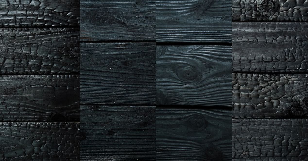 Bardage en bois brûlé yakisugi épicéa — technique shou-sugi-ban — showroom Floorz La Grande Parqueterie